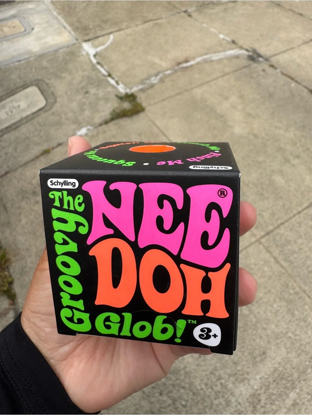 The Nee Doh Groovy Glob! Stress Ball Toy - Pink & Orange
